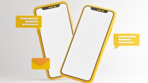 Two yellow smartphones with blank speech bubbles and a closed envelope on a white background.