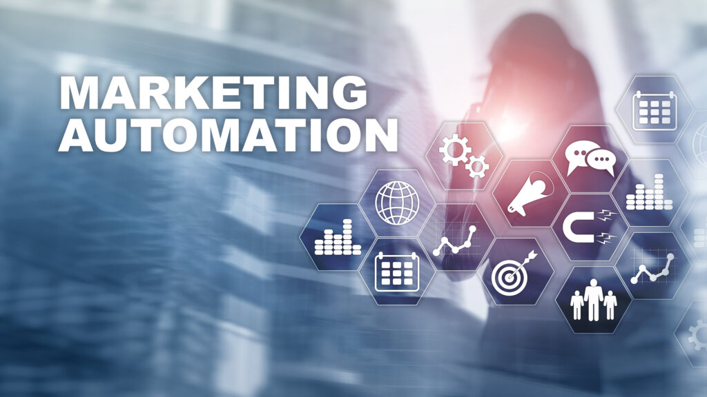 A woman standing in front of a blurred background with the words 'Marketing Automation' prominently displayed. Surrounding the text are icons representing various marketing tools and strategies