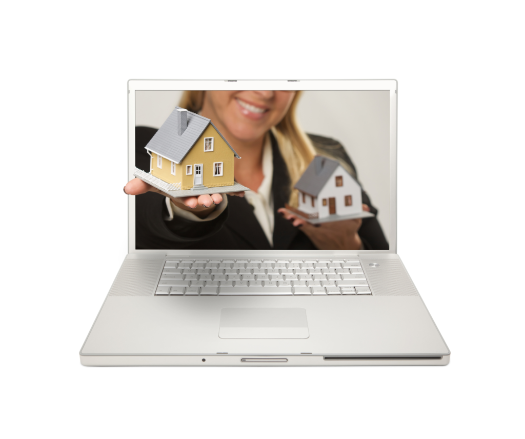 A laptop screen displays a person holding a model house, symbolizing real estate software and online property management.