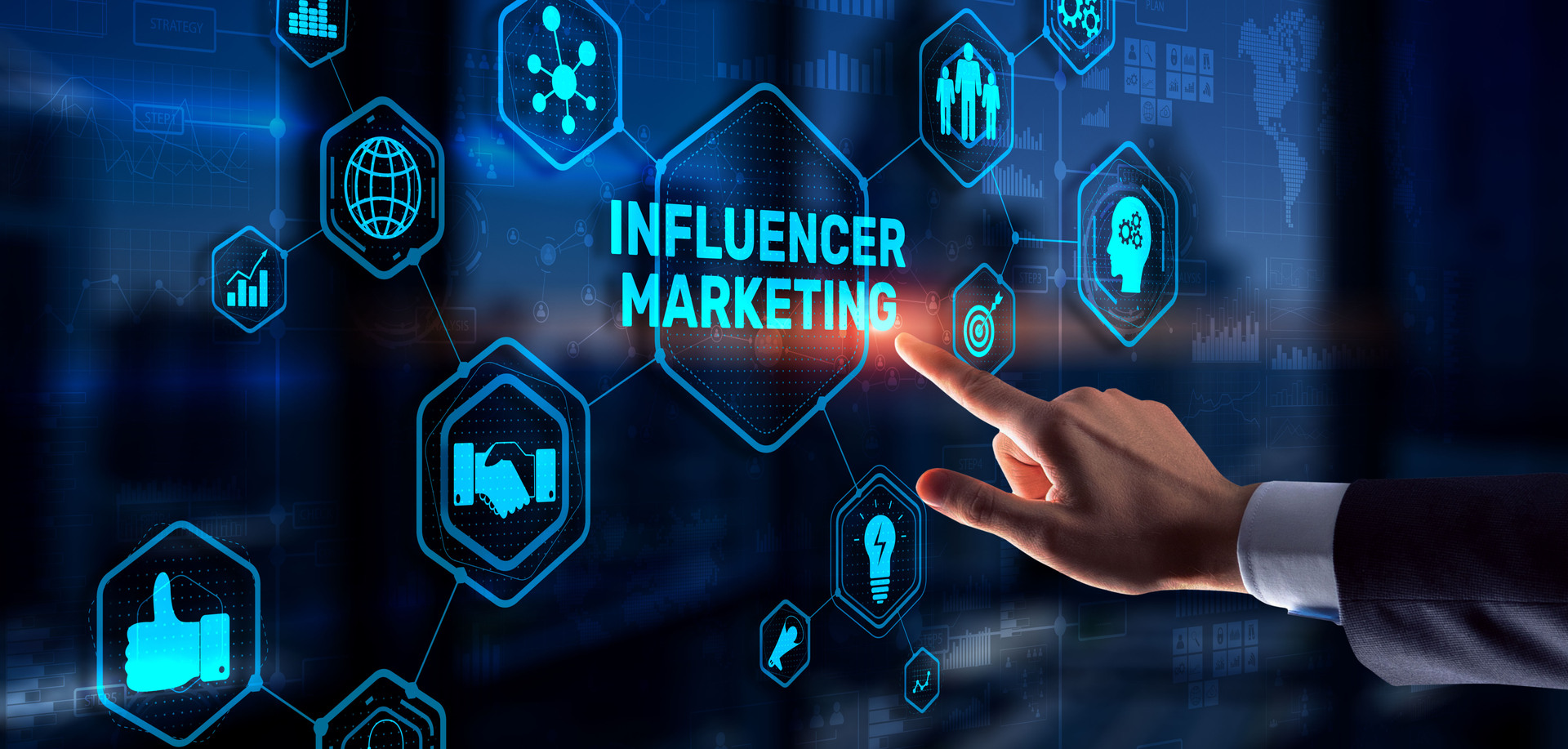 A person points to the word "Influencer Marketing" on a digital display with various icons representing social media, engagement, and collaboration.